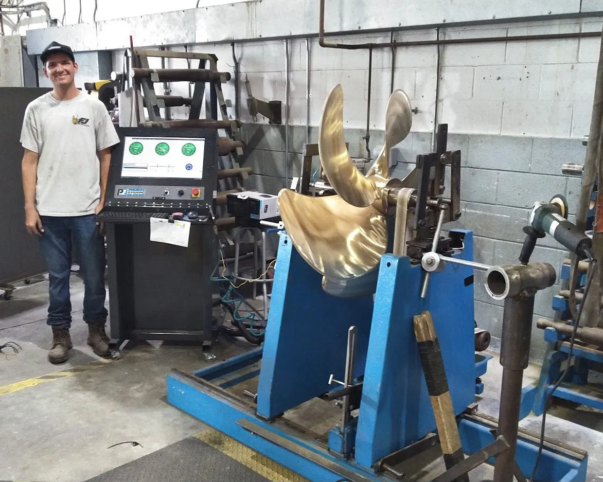 ProBal technician performing an on-site balancing machine upgrade