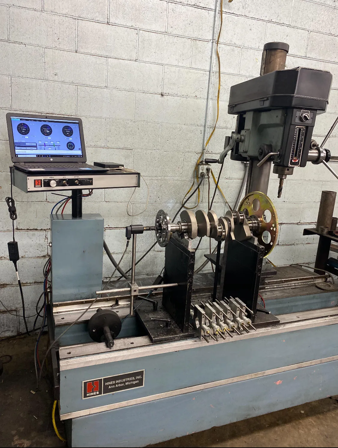 Rotary encoder retrofitted to the column of a Hines balancing machine